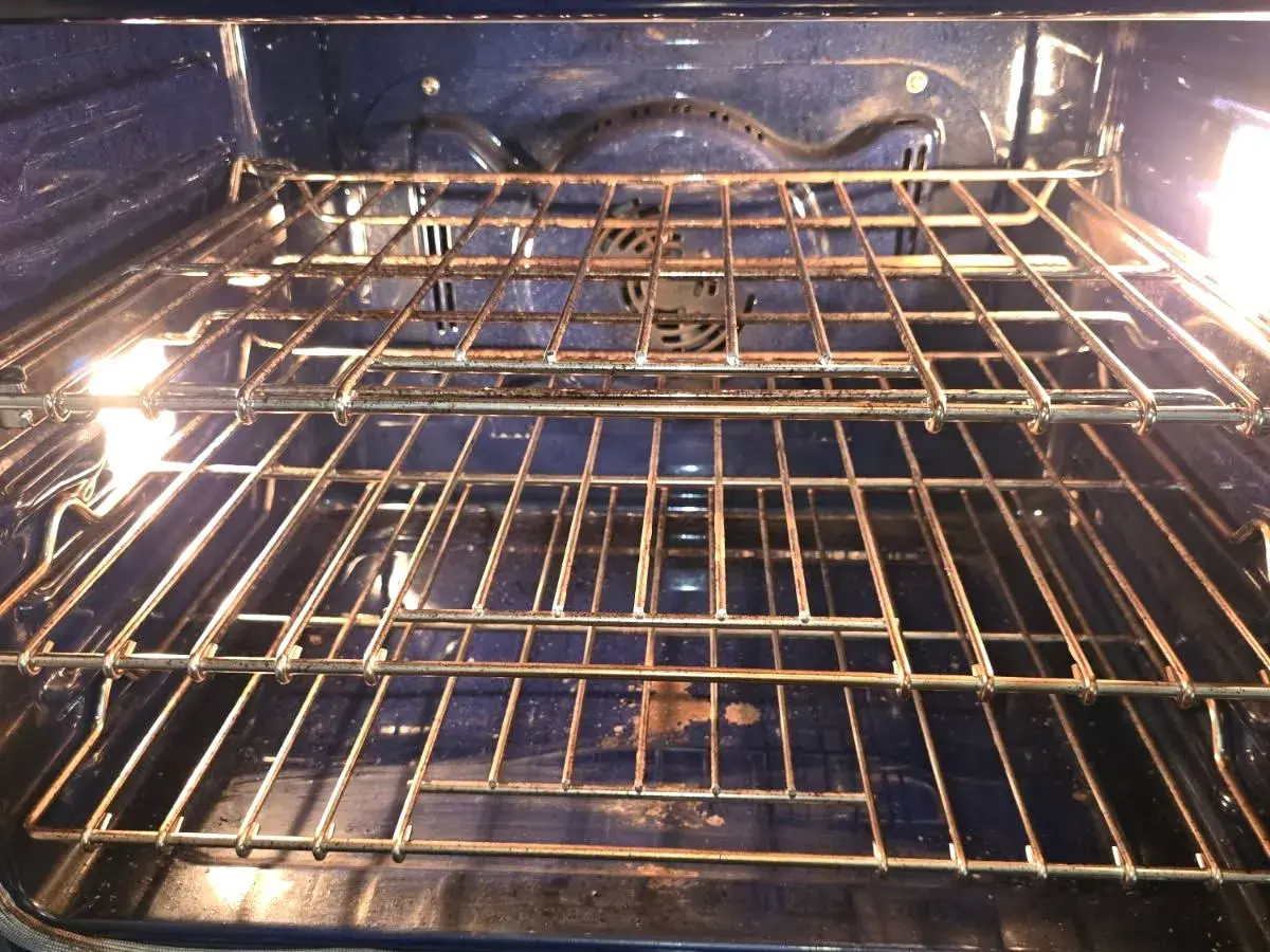 Oven interior and racks cleaned during a CleanieUp deep cleaning in Winter Garden, FL