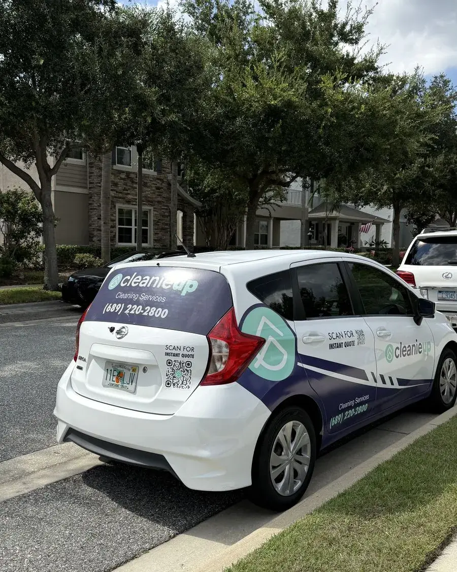 CleanieUp car parked at a building for a commercial cleaning in Ferndale, FL