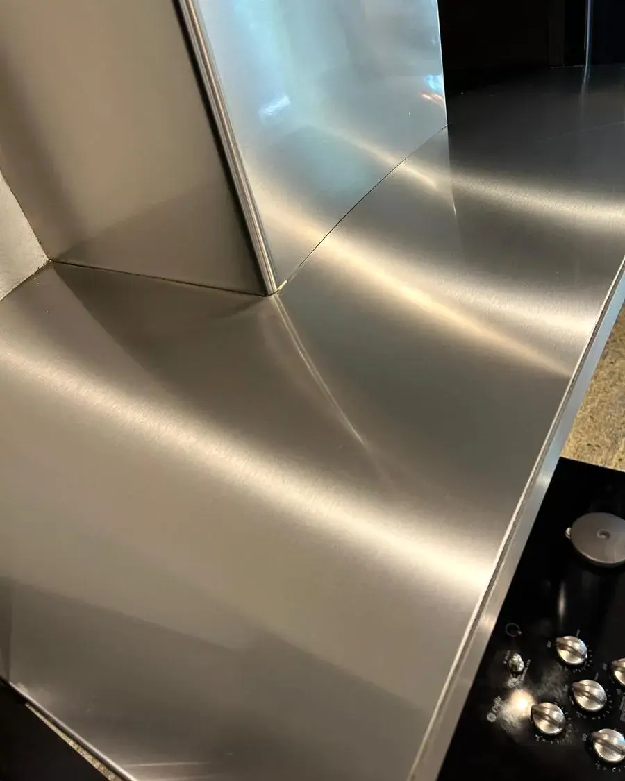 Stainless steel work surface wiped to a shine during a commercial cleaning in Minneola, FL