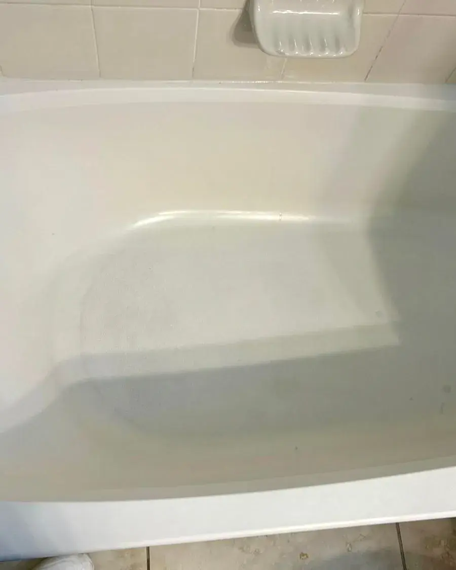 Freshly cleaned white soaking tub after a weekly house cleaning in Minneola, FL