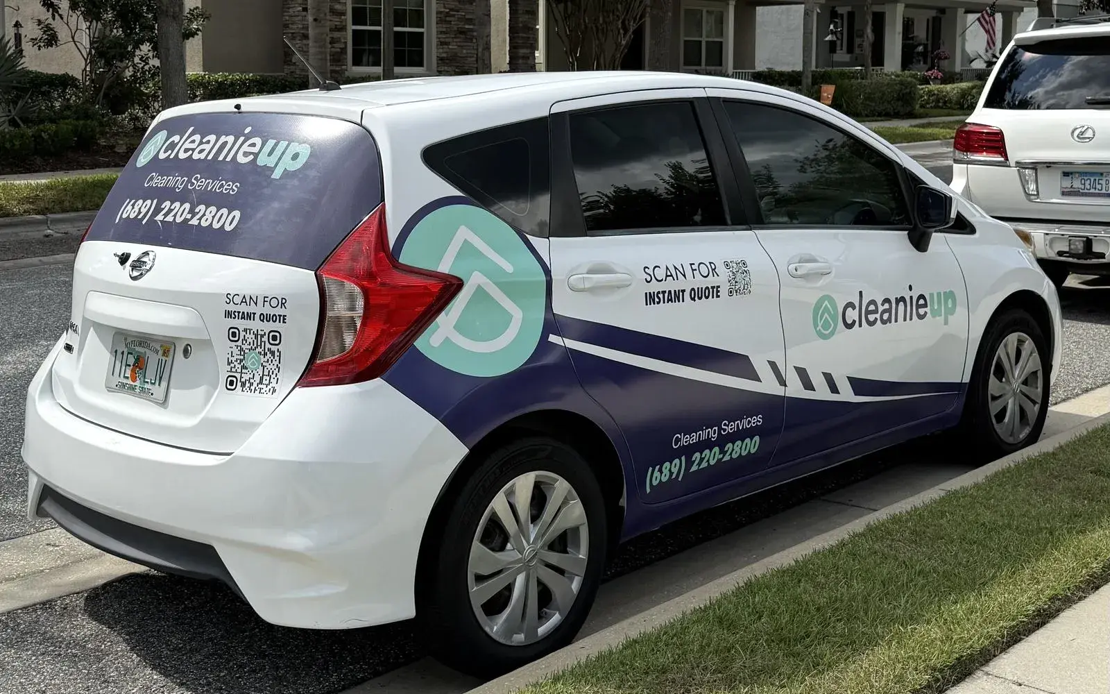 CleanieUp branded car parked outside a home for a biweekly cleaning in Winter Garden, FL