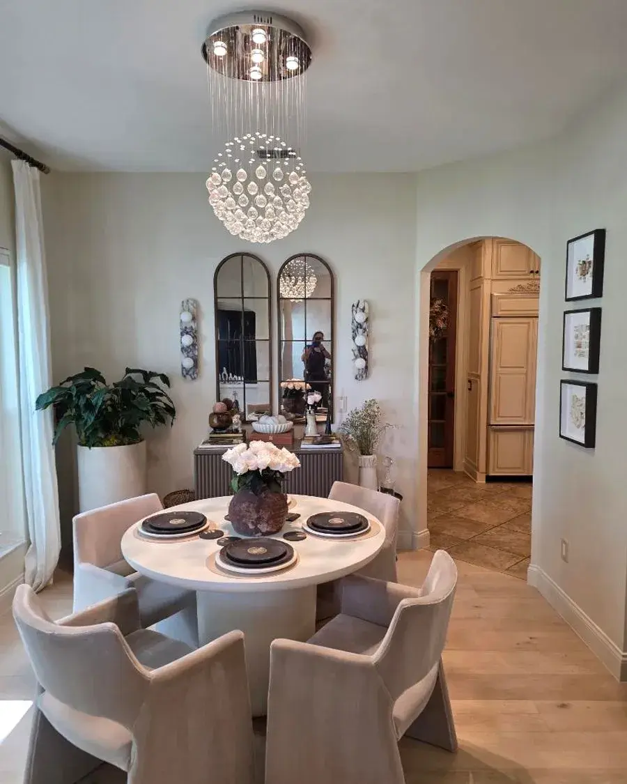 Freshly cleaned dining room with a polished table and chandelier in a Winter Garden, FL home