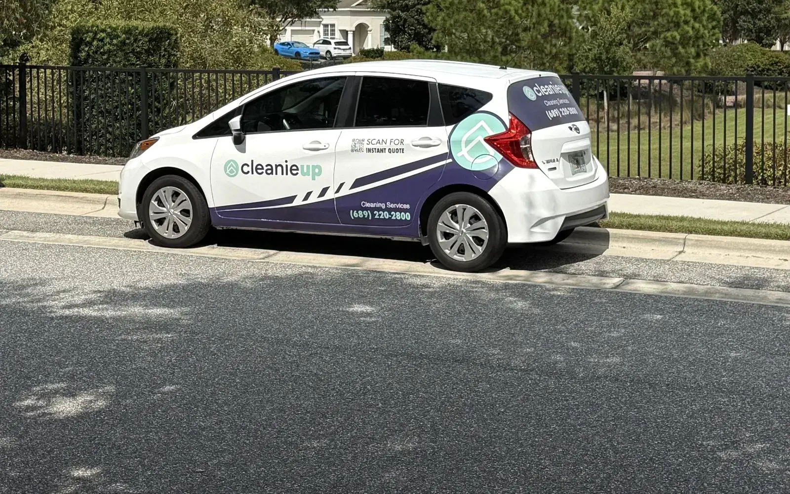 CleanieUp branded car parked on a residential street in Winter Garden, FL CleanieUp branded car parked on a residential street in Winter Garden, FL