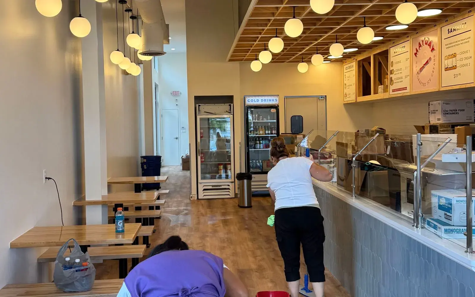 CleanieUp team cleaning a cafe dining room and counter in Winter Garden, FL CleanieUp team cleaning a cafe dining room and counter in Winter Garden, FL